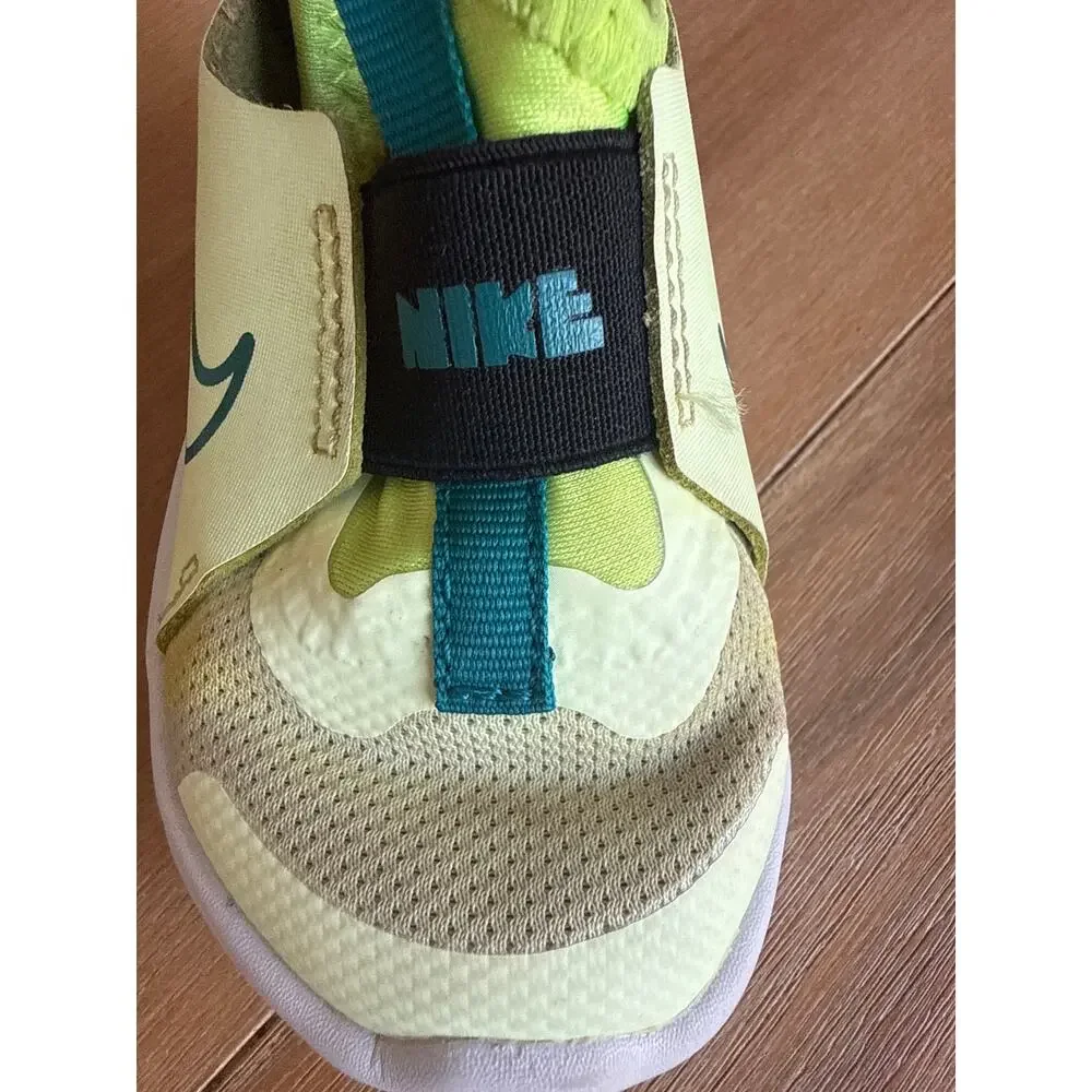 Nike Flex Runner 2 kids' shoes, specifically in the 'Barely Volt' size 4 Toddler